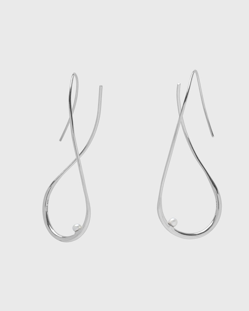 Sustainable and ethical unusual, lightweight silver hoop earrings with a freshwater pearl by London Independent Jewelry brand  Bar Jewellery. 