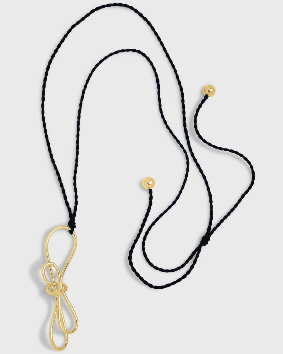 Tutti i bijoux più cool da regalare a Natale! 210 EMBRACE NECKLACE GOLD BLACK CORD BAR JEWELLERY 63622a1c fe0f 4259 82f1