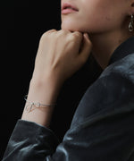 Fiocco Bracelet: A playful, abstract twist on the classic bow shape, this bracelet wraps seamlessly around the wrist. The Fiocco Ring and Earrings complete the set. By London based Bar Jewellery, using recycled silver