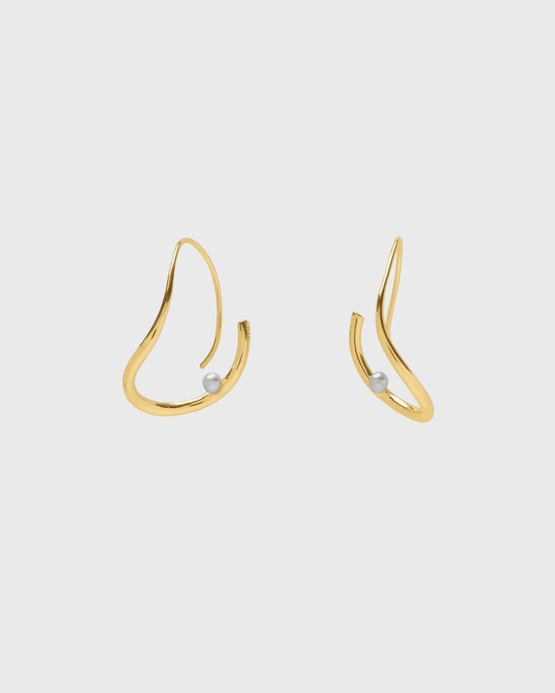 Sustainable and ethical unusual, lightweight gold plated hoop earrings with a freshwater pearl by London Independent Jewelry brand  Bar Jewellery. 