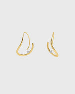 Sustainable and ethical unusual, lightweight gold plated hoop earrings with a freshwater pearl by London Independent Jewelry brand  Bar Jewellery. 