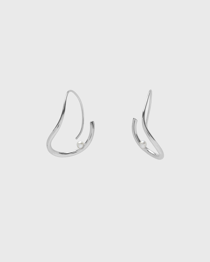 Sustainable and ethical unusual, lightweight silver hoop earrings with a freshwater pearl by London Independent Jewelry brand  Bar Jewellery. 