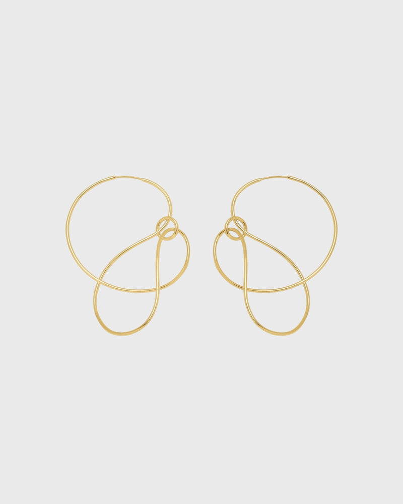 Sustainable and ethical unusual, lightweight gold plated silver hoop earrings by London Independent Jewelry brand  Bar Jewellery. 