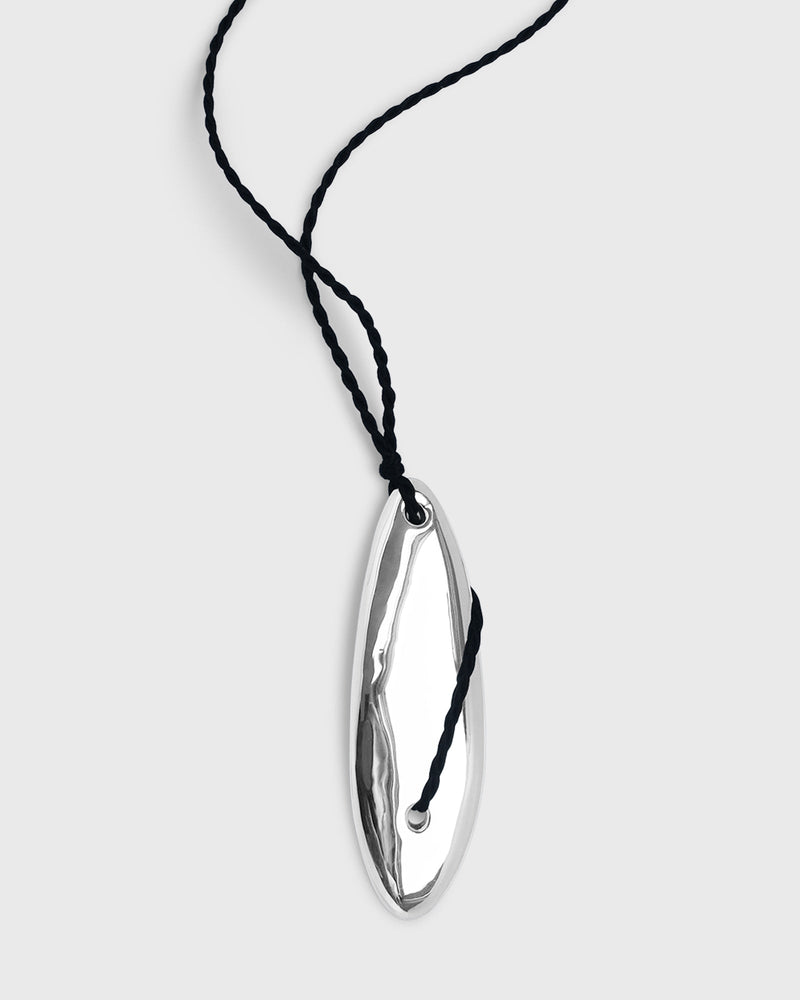 Sustainable and ethical unusual, statement chunky silver necklace with black silk twisted cord by London Independent Jewelry brand  Bar Jewellery. 