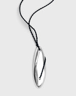 Sustainable and ethical unusual, statement chunky silver necklace with black silk twisted cord by London Independent Jewelry brand  Bar Jewellery. 