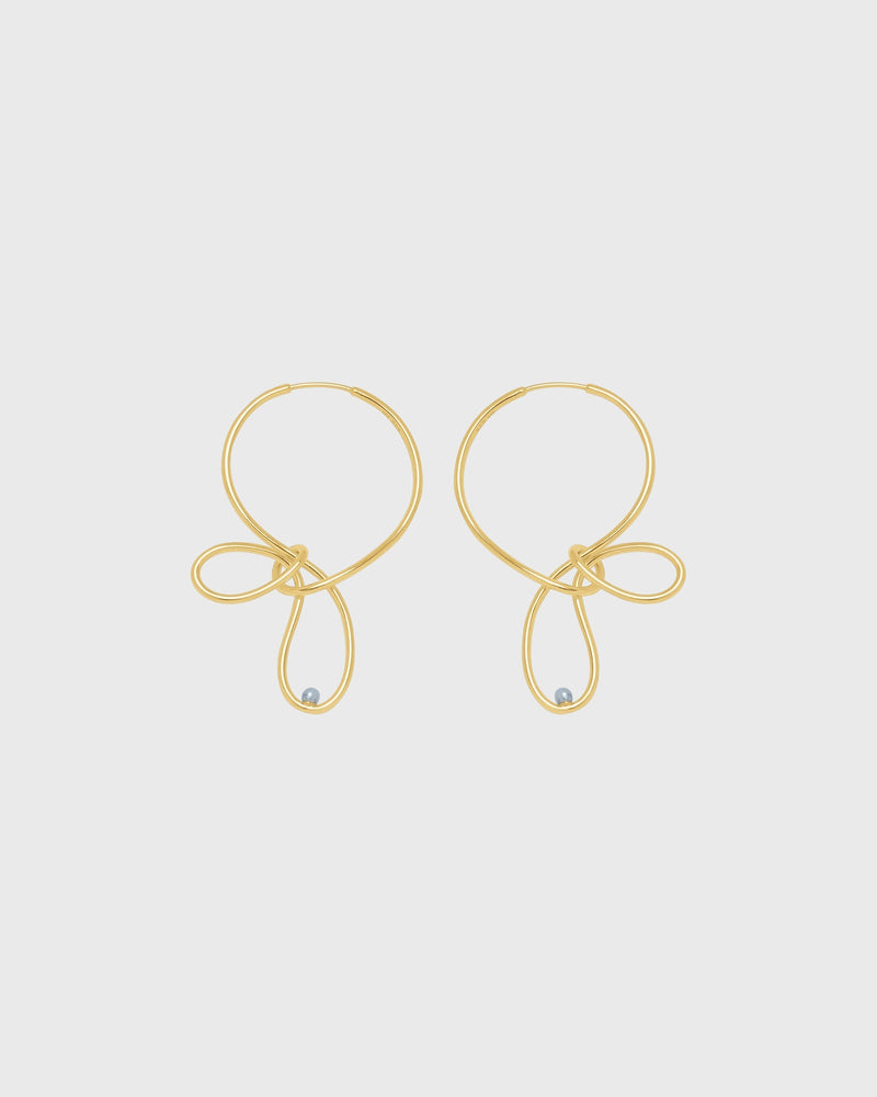 Sustainable and ethical unusual, lightweight gold plated silver hoop earrings by London Independent Jewelry brand  Bar Jewellery. 