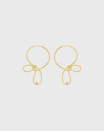 Sustainable and ethical unusual, lightweight gold plated silver hoop earrings by London Independent Jewelry brand  Bar Jewellery. 