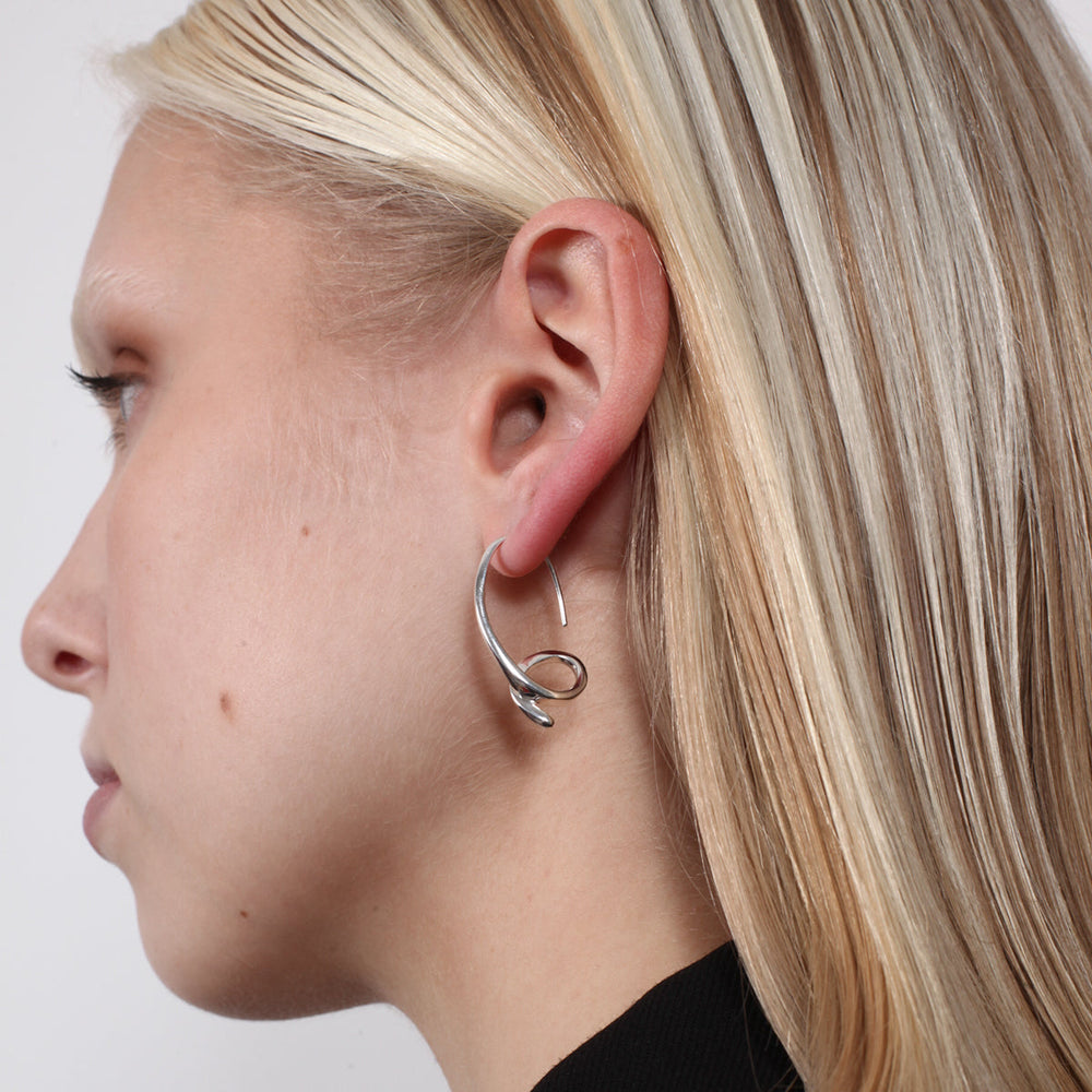 BAR Jewellery Sustainable Phi Earrings In Silver Drop Style, Placed On Ear
