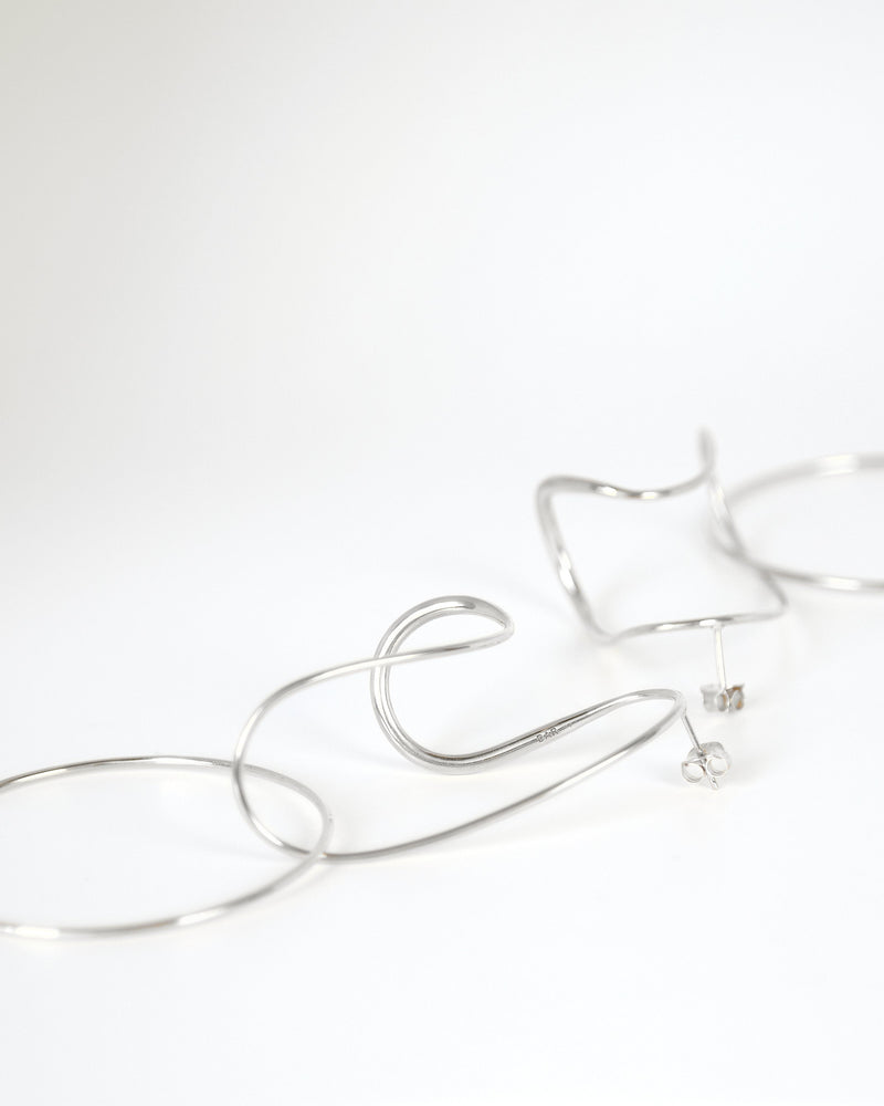 Opposing Forms Earrings | Silver
