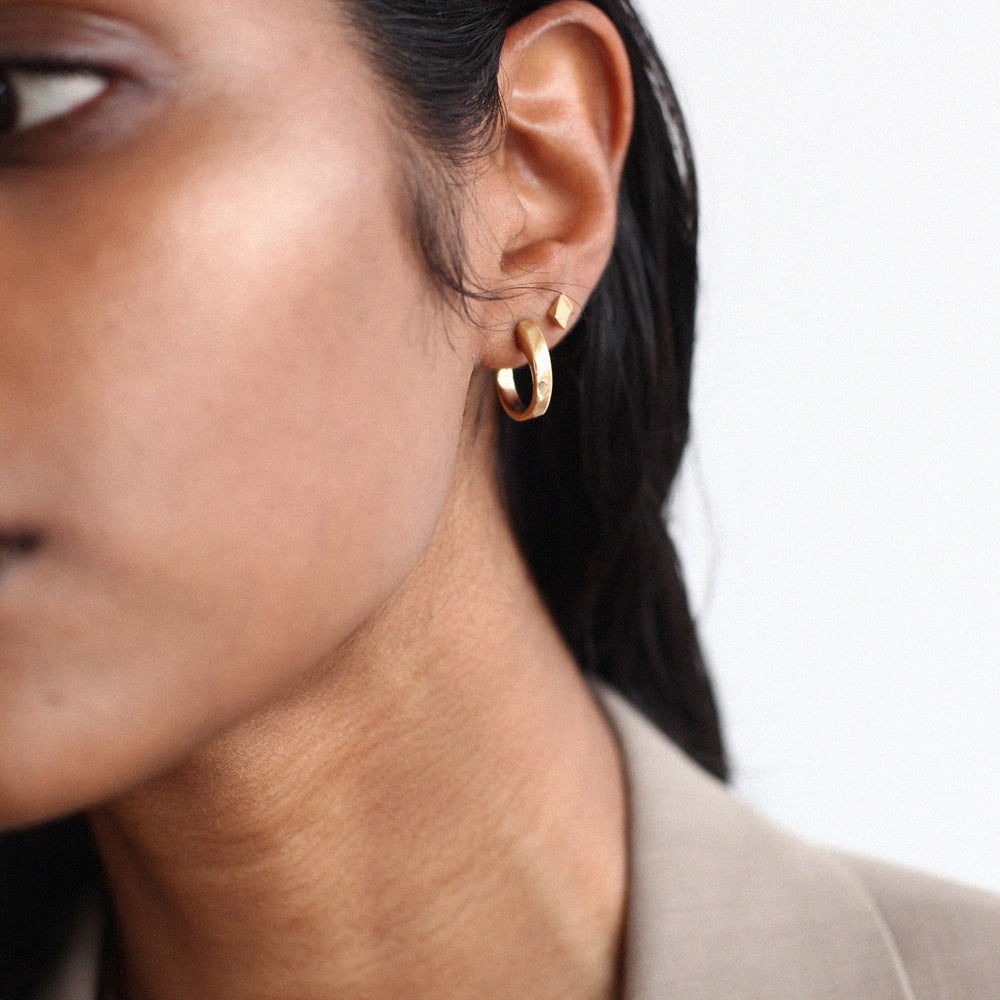 BAR Jewellery Sustainable Coppia and Taper Earrings In Gold, Worn On Ear
